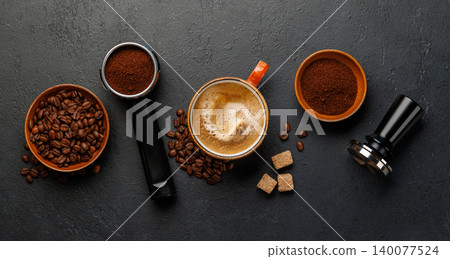 Espresso preparation tools and coffee beans flat lay composition 140077524
