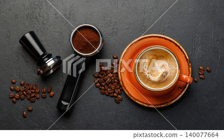 Espresso preparation tools and coffee beans flat lay composition 140077664