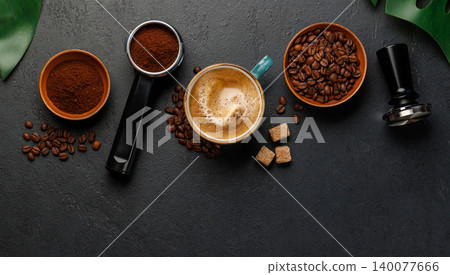 Espresso preparation tools and coffee beans flat lay composition 140077666