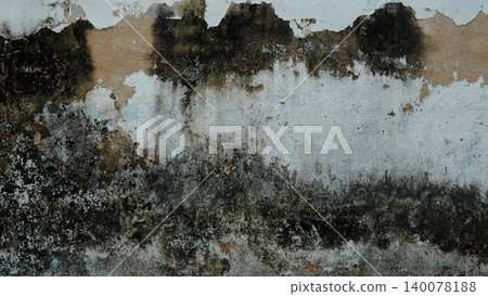 Abstract textured background of a severely weathered and moldy plastered wall with peeling paint 140078188