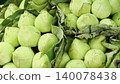 Fresh green lotus flower buds in a bundle with leaves for religious offering 140078438