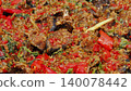 Spicy stir-fried catfish with red chili and Thai basil, a popular Thai dish 140078442