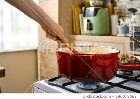 Cooking a meal with fresh ingredients in a kitchen setting during the day Cooking a meal with fresh ingredients in a kitchen setting during the day 140078562