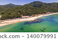 Beautiful white sand and crystal-clear waters: Coastal scenery around Takenami, Fukui Prefecture (drone aerial photography) 140079991