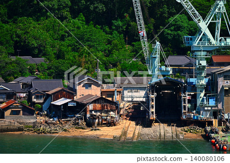A small shipyard that builds and repairs fishing boats. A small shipyard that builds and repairs fishing boats. 140080106