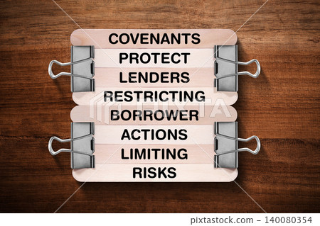 Covenants Protect Lenders Restricting Borrower Actions Limiting Risks tagline written on wooden stick hold by binder clip with wooden texture background, business and investment, stock market theme Covenants Protect Lenders Restricting Borrower Actions Limiting Risks tagline written on wooden stick hold by binder clip with wooden texture background, business and investment, stock market theme 140080354