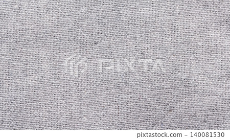 Natural gray linen fabric texture close up showing woven cotton threads for textile background Natural gray linen fabric texture close up showing woven cotton threads for textile background 140081530