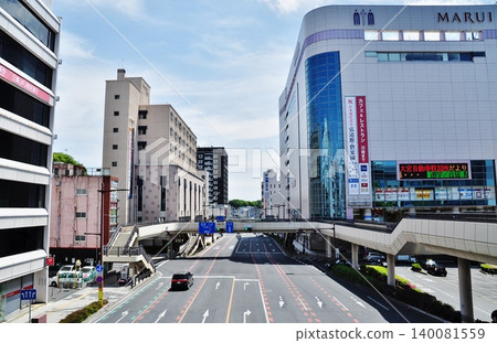 The cityscape in front of Mito Station and the pedestrian deck on a sunny day. 140081559