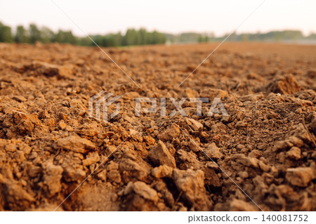 Black earth for plant background. Close-up of black soil prepared before sowing plants. Black earth for plant background. Close-up of black soil prepared before sowing plants. 140081752