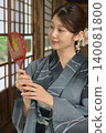 A young woman in a yukata 140081800