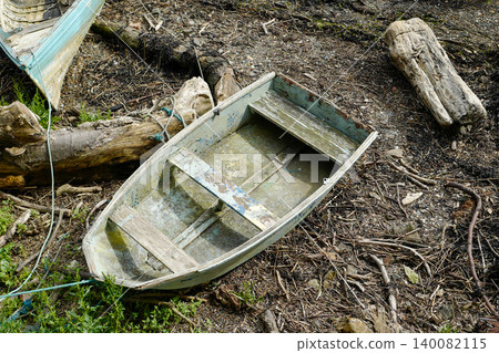 Old boats on the shore line in various state of decay 140082115