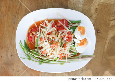 spicy salad, som tam or Thai spicy salad or papaya salad or vegetable salad spicy salad, som tam or Thai spicy salad or papaya salad or vegetable salad 140082552