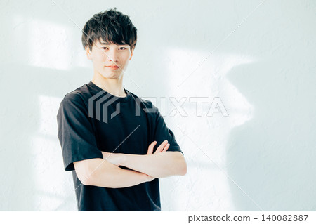 A young male trainer looking directly at the camera. A young male trainer looking directly at the camera. 140082887
