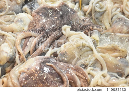 raw squid ingredient food topping ice for fresh keeping on refrigerator displays at supermarket raw squid ingredient food topping ice for fresh keeping on refrigerator displays at supermarket 140083280
