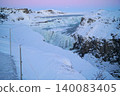 Gyao, the Earth's rift with a blue sky and snowy landscape - Iceland 140083405