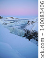 Gyao, the Earth's rift with a blue sky and snowy landscape - Iceland 140083406