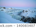 Gyao, the Earth's rift with a blue sky and snowy landscape - Iceland 140083407
