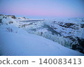 Gyao, the Earth's rift with a blue sky and snowy landscape - Iceland 140083413