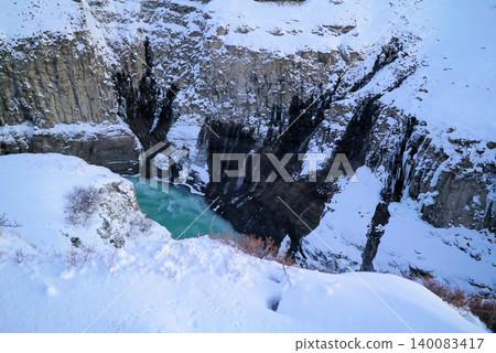 Gyao, the Earth's rift with a blue sky and snowy landscape - Iceland Gyao, the Earth's rift with a blue sky and snowy landscape - Iceland 140083417