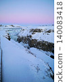 Gyao, the Earth's rift with a blue sky and snowy landscape - Iceland 140083418