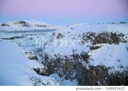 Gyao, the Earth's rift with a blue sky and snowy landscape - Iceland 140083422