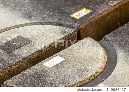 The joint between the semicircular concrete protrusions of the Shinkansen slab track and the track slab (railway infrastructure material) 140084417