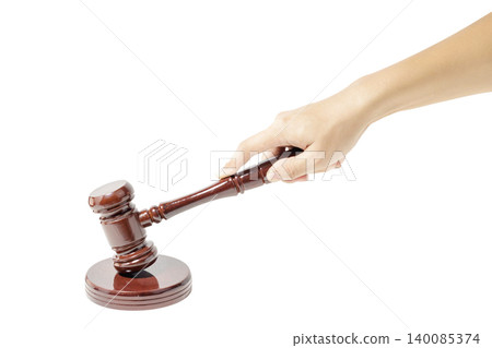 Hand holding a wooden gavel in White Background. Isolated Background. Justice and Law Concept. Judge, Legal and Authority Symbol. High quality photo Hand holding a wooden gavel in White Background. Isolated Background. Justice and Law Concept. Judge, Legal and Authority Symbol. High quality photo 140085374