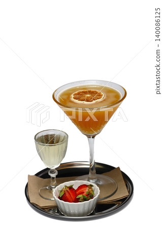 fresh alcohol coctail with fruits on the black background fresh alcohol coctail with fruits on the black background 140086125