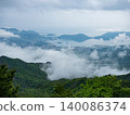 Misty panoramic landscape of Shodoshima Island with Seto Inland Sea, mountain ridges and drifting clouds. 140086374