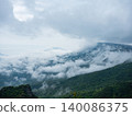 Misty panoramic landscape of Shodoshima Island with Seto Inland Sea, mountain ridges and drifting clouds. 140086375
