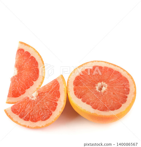 Fresh ripe pink grapefruit half and cut juicy wedges arranged beautifully together on a clean plain white background, symbolizing healthy nutrition and citrus fruit freshness. Fresh ripe pink grapefruit half and cut juicy wedges arranged beautifully together on a clean plain white background, symbolizing healthy nutrition and citrus fruit freshness. 140086567