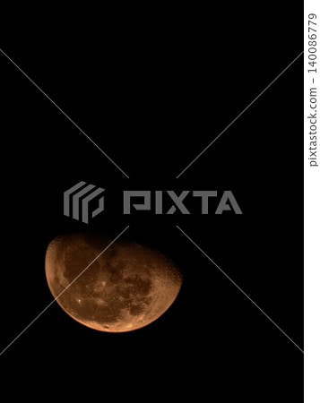 Large Orange Blood Moon in Dark Night Sky Large Orange Blood Moon in Dark Night Sky 140086779