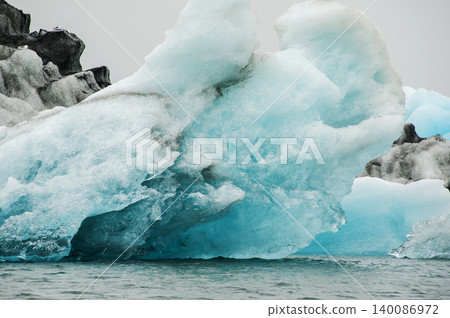 Icebergs in Jokulsarlon, a glacial lake in Iceland Icebergs in Jokulsarlon, a glacial lake in Iceland 140086972