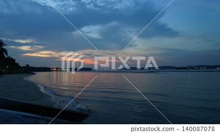 Twilight Seascape Peaceful Beach and Colorful Sky Reflections Twilight Seascape Peaceful Beach and Colorful Sky Reflections 140087078