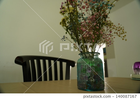 Colorful Gypsophila Flowers in a Glass Vase Still Life Colorful Gypsophila Flowers in a Glass Vase Still Life 140087167