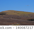 A glider flying over Mount Kurumayama in the Kirigamine Highlands. 140087217