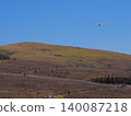 A glider flying over Mount Kurumayama in the Kirigamine Highlands. 140087218