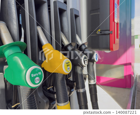Fuel Nozzles at Modern Gas Station Pump Fuel Nozzles at Modern Gas Station Pump 140087221