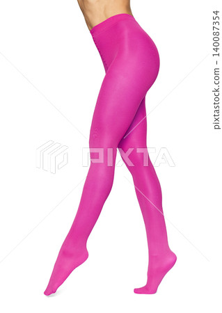 Woman wearing vibrant pink opaque hosiery tights 140087354