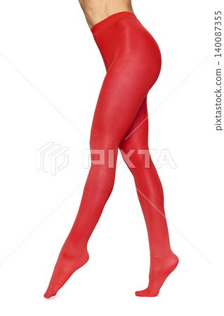 Woman wearing vibrant red pantyhose on white background Woman wearing vibrant red pantyhose on white background 140087355