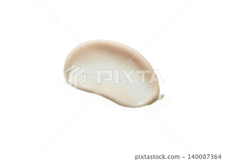 Cosmetic cream swatch displaying beige moisturizer texture on white Cosmetic cream swatch displaying beige moisturizer texture on white 140087364