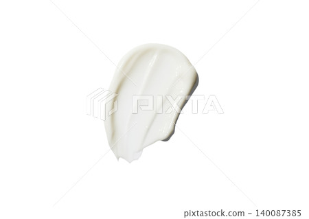 White cream swatch with textured cosmetic smear 140087385