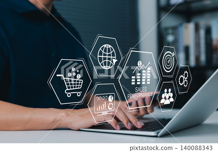 Sales performance and e-commerce analytics concept. person using laptop with shopping cart, growth chart, target, customer, website, revenue dashboard and automation icons. online sales strategy Sales performance and e-commerce analytics concept. person using laptop with shopping cart, growth chart, target, customer, website, revenue dashboard and automation icons. online sales strategy 140088343