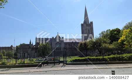 Dublin, Ireland - May 26, 2023: facade and tower of St Patrick's Cathedral Dublin, Ireland - May 26, 2023: facade and tower of St Patrick's Cathedral 140088427