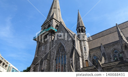 Dublin, Ireland - May 26, 2023: entrance and stone facade of St Andrew's Church Dublin, Ireland - May 26, 2023: entrance and stone facade of St Andrew's Church 140088431