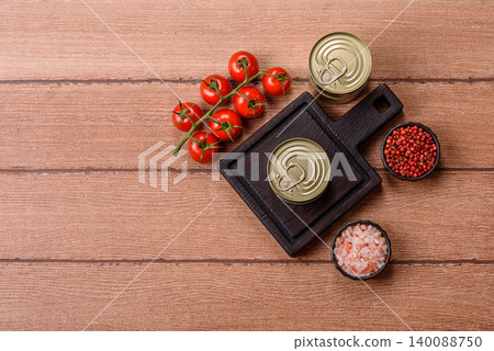 A metal tin can of meat, fish, or dog or cat food. A tin can of food 140088750