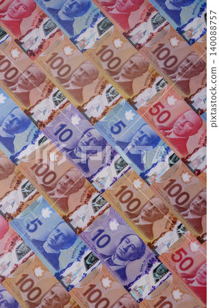 Money, currency of Canada, dollar banknotes of various denominations. Canadian money Money, currency of Canada, dollar banknotes of various denominations. Canadian money 140088757