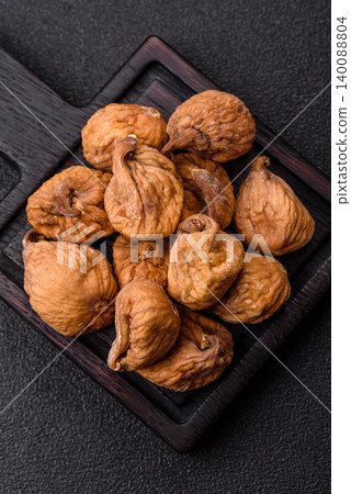 Dried whole fig as an ingredient for sweet desserts. Dried figs as a food Dried whole fig as an ingredient for sweet desserts. Dried figs as a food 140088804