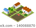 Red tractor plowing cultivated land in farm with barns 140088870