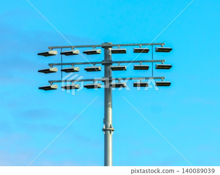 A large light tower head assembly at an outdoor sporting facility A large light tower head assembly at an outdoor sporting facility 140089039